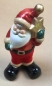 Weihnachtsmann stehend mit Stern